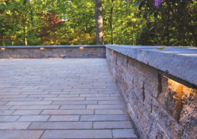 Hardscape under coping light on knee wall